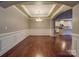 Formal dining room with hardwood floors and elegant chandelier at 2836 Santiago Cir, Monroe, NC 28110