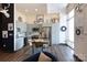 Modern kitchen with light teal cabinets, breakfast bar and stainless steel appliances at 300 Magnolia Ave # 301, Charlotte, NC 28203