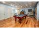 Basement game room featuring a pool table and hardwood floors at 3196 Stonemill Path, Sherrills Ford, NC 28673