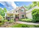 Two-story house with stone and siding exterior, plus a front porch at 3196 Stonemill Path, Sherrills Ford, NC 28673