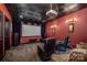 Home theater with projector, screen, and comfortable seating at 3196 Stonemill Path, Sherrills Ford, NC 28673