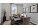 Elegant dining room with hardwood floors and a lovely window at 3917 Coleman Dr, Charlotte, NC 28215