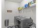 Laundry room with washer, dryer, and shelving at 4020 Harmony Hills Dr, Matthews, NC 28104