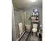 Small bathroom with shower/tub combo and shelving at 4126 Oxford School Rd, Catawba, NC 28609