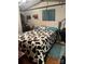 Bedroom with a cow print comforter and a TV at 4126 Oxford School Rd, Catawba, NC 28609