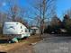 Long gravel driveway with RV and small cabin at 4126 Oxford School Rd, Catawba, NC 28609