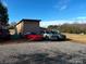 Large storage shed with multiple vehicles parked in front at 4126 Oxford School Rd, Catawba, NC 28609