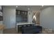 Home bar with seating and modern finishes at 4218 Sigmon Cove Ln # 6, Terrell, NC 28682