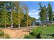 Lakefront property with lush landscaping and a pier at 4218 Sigmon Cove Ln # 6, Terrell, NC 28682