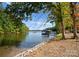 Serene lakefront view with private dock and boathouse at 4218 Sigmon Cove Ln # 6, Terrell, NC 28682