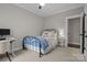 Bedroom featuring a full-size bed and ceiling fan at 423 Solomon St, Charlotte, NC 28216