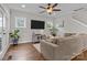 Spacious living room with comfortable sectional sofa and large TV at 423 Solomon St, Charlotte, NC 28216