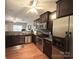 Modern kitchen featuring dark cabinetry and stainless steel appliances at 435 Battery Cir, Clover, SC 29710