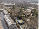 Aerial view of a house and neighborhood in Montford at 4419 Halstead Dr, Charlotte, NC 28209