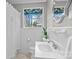 Clean bathroom with white tile, a large vanity, and a shower/tub combo at 4419 Halstead Dr, Charlotte, NC 28209