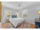 Cozy bedroom with a plush rug, neutral walls, and plenty of natural light at 4419 Halstead Dr, Charlotte, NC 28209