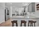 Modern kitchen with gray cabinets and granite countertops at 450 Caleb St, Monroe, NC 28110