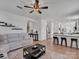 Open living room with a view of the kitchen and dining area at 450 Caleb St, Monroe, NC 28110