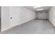 Clean, spacious one-car garage with epoxy floors and an automatic door at 5048 York Park Ln, Charlotte, NC 28217