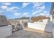 Spacious roof deck offers stunning views of the neighborhood, perfect for entertaining at 5048 York Park Ln, Charlotte, NC 28217