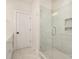 Modern bathroom showcasing a glass shower enclosure with subway tile and built-in niches at 5048 York Park Ln, Charlotte, NC 28217