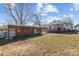 Large backyard with a partially completed outbuilding and house visible at 535 5Th St, Chester, SC 29706