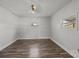 Cozy bedroom with two windows allowing natural light and wood laminate flooring at 535 5Th St, Chester, SC 29706