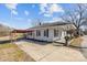 Inviting single-story home featuring a covered porch, carport, and well-kept front yard at 535 5Th St, Chester, SC 29706