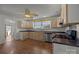 Bright kitchen with stainless steel appliances and wood flooring at 535 5Th St, Chester, SC 29706