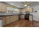 Modern kitchen featuring wood flooring and stainless steel appliances at 535 5Th St, Chester, SC 29706