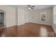 View of living room, hardwood floors, and access to bathroom at 535 5Th St, Chester, SC 29706