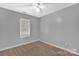 Small bedroom with neutral walls and carpeted floor at 5704 Bentgrass Ct, Monroe, NC 28110