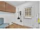 Laundry room with built-in cabinets and exterior access at 5704 Bentgrass Ct, Monroe, NC 28110