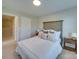 Well-lit bedroom featuring a queen-size bed and access to hallway at 574 Altamonte Dr, Clover, SC 29710