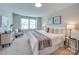 Main bedroom with king-size bed and sitting area at 574 Altamonte Dr, Clover, SC 29710