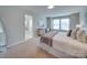 Spacious bedroom with plush carpet and ensuite bathroom access at 574 Altamonte Dr, Clover, SC 29710