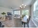 Dining area with sliding glass doors and wood table at 574 Altamonte Dr, Clover, SC 29710