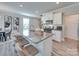 Modern kitchen with granite countertops and white cabinets at 574 Altamonte Dr, Clover, SC 29710