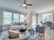 Open living space with seating area, dining area and view to backyard at 574 Altamonte Dr, Clover, SC 29710