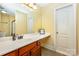 Bathroom with single vanity and a shower at 6057 Erie View Ct, Denver, NC 28037