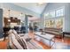 Relaxing living room with vaulted ceilings, hardwood floors, and a cozy fireplace at 6057 Erie View Ct, Denver, NC 28037