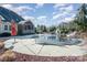 Inviting in-ground pool with a pool cover at 6057 Erie View Ct, Denver, NC 28037