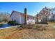 House exterior showcasing side yard and patio at 6615 Love Mill Rd, Monroe, NC 28110