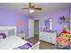 Purple bedroom with double bed and white dresser at 6615 Love Mill Rd, Monroe, NC 28110