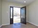 Open door revealing a view of the backyard at 6615 Love Mill Rd, Monroe, NC 28110