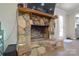 Stone fireplace is a focal point in the living room at 6615 Love Mill Rd, Monroe, NC 28110