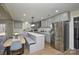 Modern kitchen with stainless steel appliances and breakfast bar at 6615 Love Mill Rd, Monroe, NC 28110