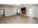 Spacious open concept living area featuring beautiful fireplace and flooring at 6615 Love Mill Rd, Monroe, NC 28110