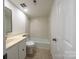 Bathroom with a bathtub and double vanity at 7151 Stonington Ln, Charlotte, NC 28227