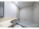 Bathroom with bathtub and shower at 7151 Stonington Ln, Charlotte, NC 28227